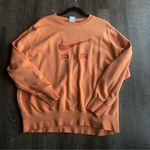Nike womens Crewneck Sweater in Orange